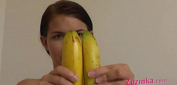 How-to Young brunette girl teaches using a banana